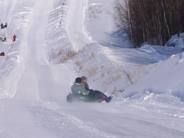 Glissade sur tube